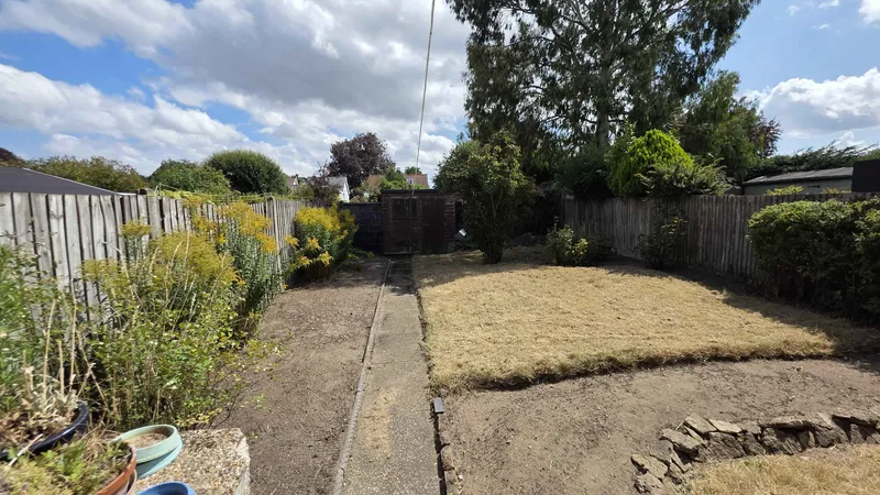 Cleared garden with cut lawn and reopened path after GreenRun work